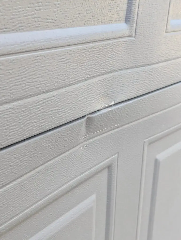 Dented Garage Door